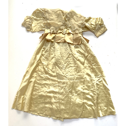 927 - A satin child's dress, early Victorian, with lace collar