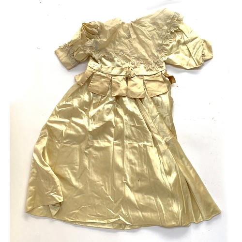 927 - A satin child's dress, early Victorian, with lace collar