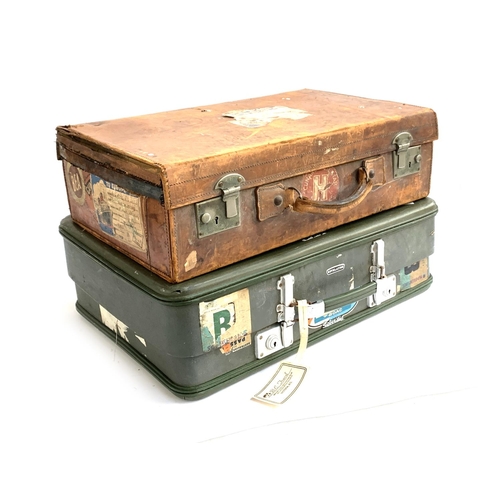 1050 - A Revelation 'Silverline' vintage suitcase; together with a vintage brown leather suitcase, with tra... 