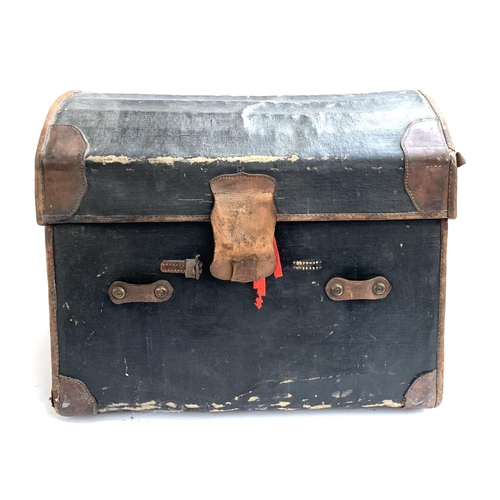 1059 - A Victorian canvas domed travel trunk, made at the Army & Navy co-operative limited, with removable ... 