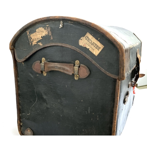 1059 - A Victorian canvas domed travel trunk, made at the Army & Navy co-operative limited, with removable ... 