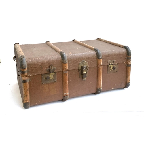 1068 - A canvas and wood banded suitcase, 76x49x33