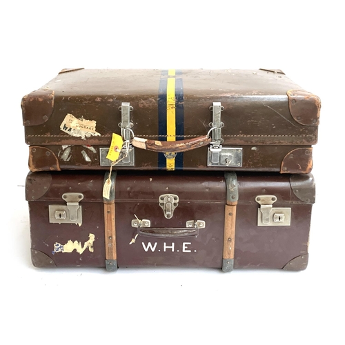 1072 - A vintage revelation suitcase with leather corners, the top marked W.H.E, with key; together with on... 