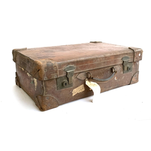 1073 - A vintage leather suitcase, with leather corners, monogrammed A.B.E, 63x41x21cm