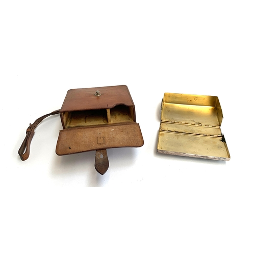 1083 - A plated sandwich box, in a fitted hard leather saddle case, 16x16x5cm, flask missing