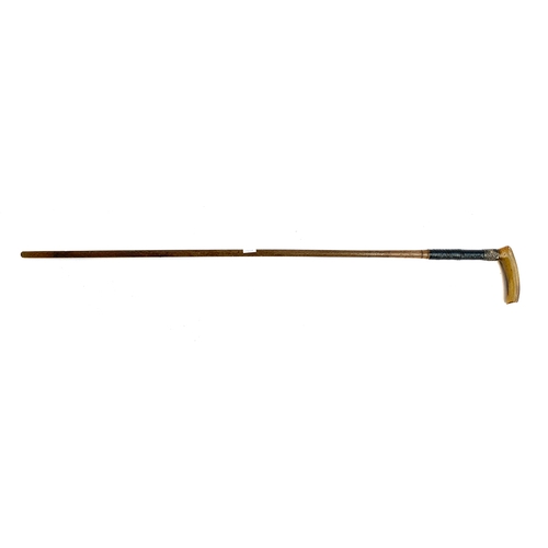 209 - A walking stick with  horn handle chased silver collar