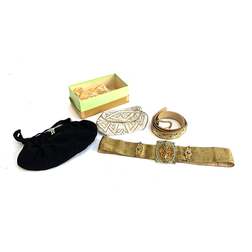 945 - Two vintage ladies belts, one with enamel and stone set clasp; together with two evening purses