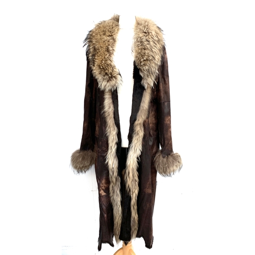 946 - A fur lined leather coat, with shawl collar, size 10 (af)