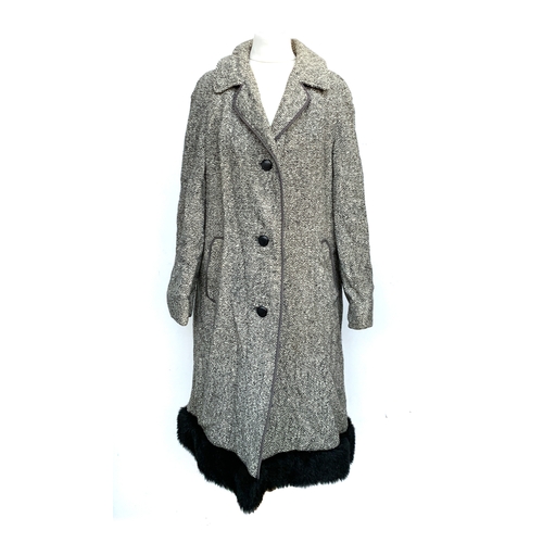 875 - A vintage ladies suede overcoat by Keleti; together with a tweed overcoat and fur trim, each size 10... 