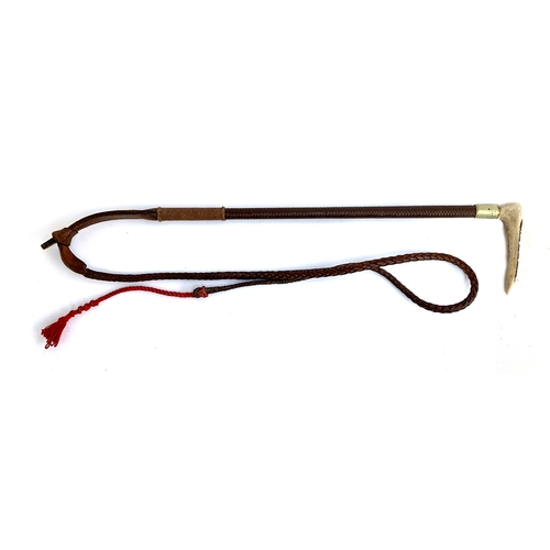 183 - A ladies whalebone and leather hunting whip with metal collar, by Swaine of London, 46cmL, the thong... 