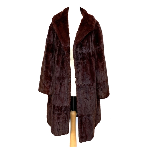 941 - A 'National Fur Company' mink coat with shawl collar; Debeuhaur Freebody London fur coat; together w... 