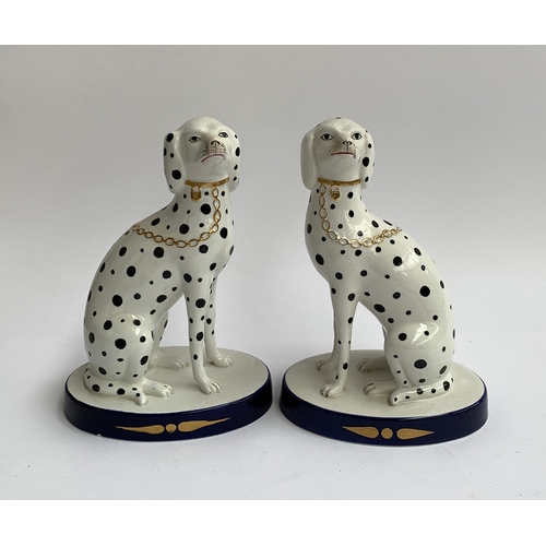 127 - A pair of Italian Staffordshire style dogs, with spot decoration, each approx. 24.5cmH