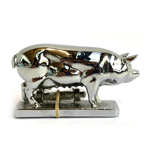 100 - A Louis Lejeune pig car mascot marked LL to the base, 11.5cm long