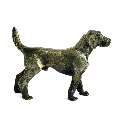 117 - A late 19th/early 20th century cast metal figure of a foxhound, 11cmL