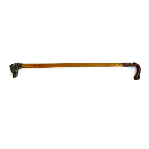 186 - A gent's bamboo hunting whip with a collared dog head, approx. 50cmL