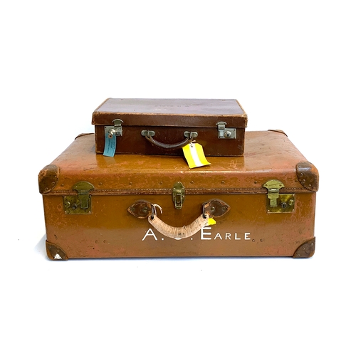 1076 - A large vintage suitcase, with leather corners, marked A. J Earle, 77x46x28cm; together with one oth... 