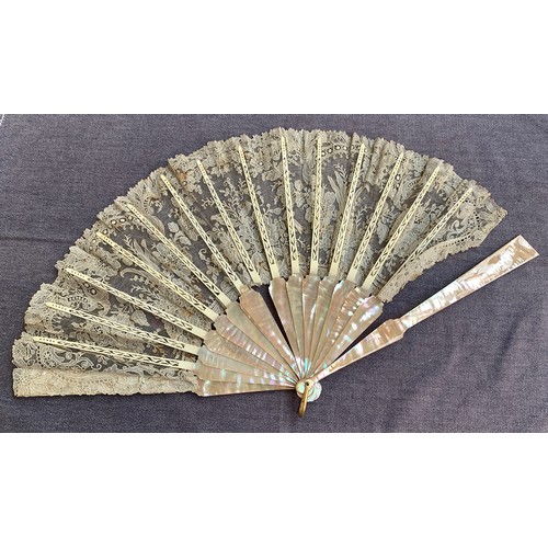 921 - Two Victorian ostrich feather fans, together with one other lace fan, and a feather fascinator