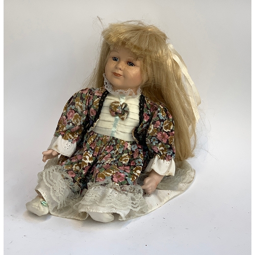 189 - A china doll, marked 9386A