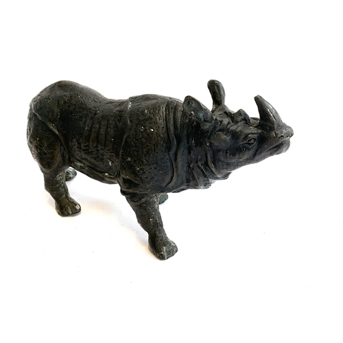 203 - A cast metal figure of a rhino, 30cmL