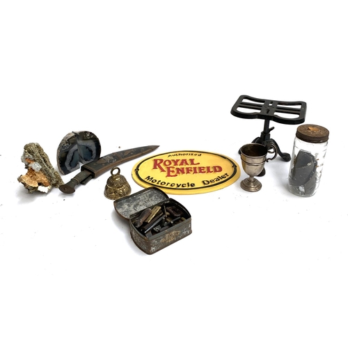 151 - A mixed lot to include loaded sterling silver goblet; Royal Enfield reproduction plaque; trivet; kuk... 