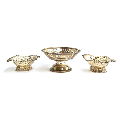 111 - A pair of late Victorian pierced silver bonbon dishes by James Deakin & Sons, London 1894; together ... 