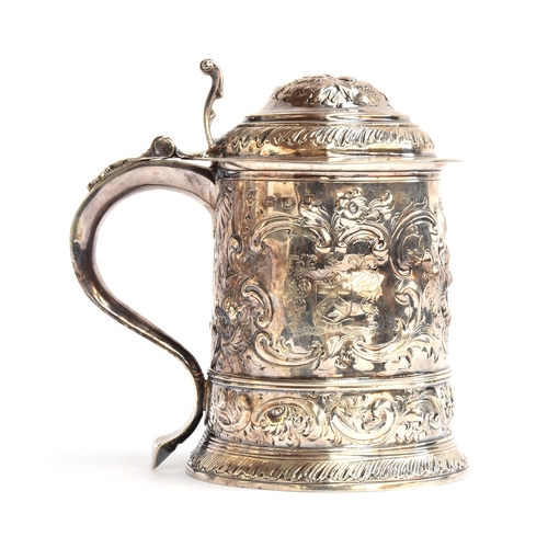 85 - A George I silver lidded tankard, by David Willaume I, London 1724, later chased, bearing the crest ... 