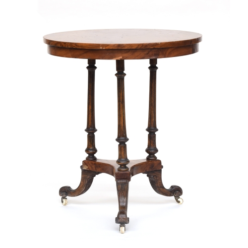 561 - A 19th century pollard oak veneer circular occasional table, raised on three reeded turned supports ... 