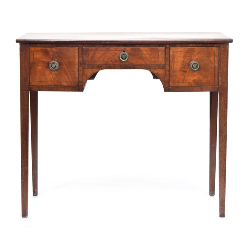 580 - A bow front Regency mahogany dressing table, kneehole with single drawer flanked by two further deep... 