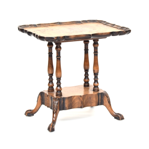 593 - A Richardson of Highgate burr walnut occasional table, with shaped rectangular top, on four turned s... 