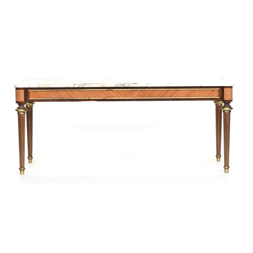 592 - A Continental marble and parcel gilt side table, the rectangular marble top over sans traverse venee... 