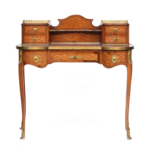 591 - A Continental ormolu desk, having superstructure with two piers each of two drawers, the gilt metal ... 