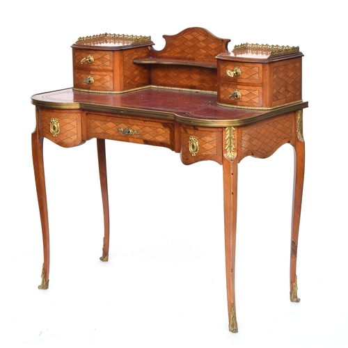 591 - A Continental ormolu desk, having superstructure with two piers each of two drawers, the gilt metal ... 