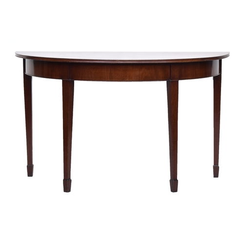 560 - A Regency mahogany demilune table on square tapered legs and spade feet, 122cm wide, 60cm deep, 71cm... 