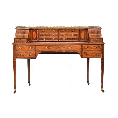 587 - A 19th century Carlton House writing desk, with a galleried super structure and an arrangement of sh... 