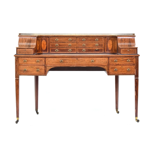 587 - A 19th century Carlton House writing desk, with a galleried super structure and an arrangement of sh... 