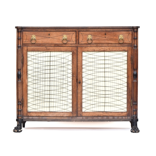 547 - A 19th century credenza, two drawers with lion mask loop handles over two pleated silk doors, openin... 