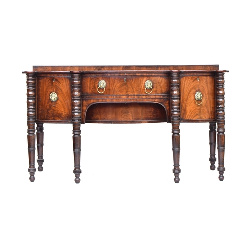 545 - A William IV mahogany bow front sideboard, raised superstructure over two central drawers flanked by... 