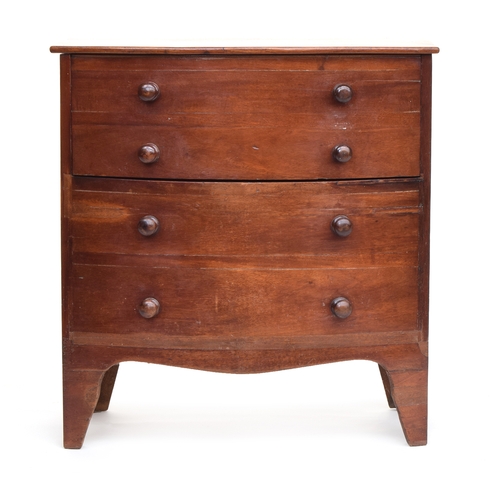 595 - A small Regency mahogany bowfront commode, in original condition, the hinged top opening to reveal t... 