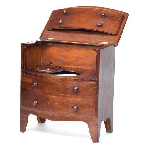 595 - A small Regency mahogany bowfront commode, in original condition, the hinged top opening to reveal t... 