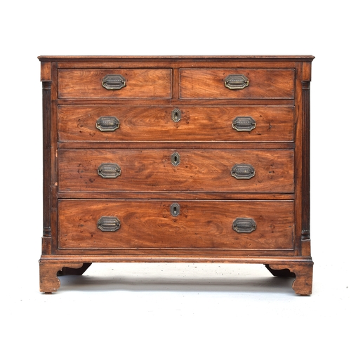 528 - A George III mahogany chest of two short over three graduating drawers, the drawers flanked by reede... 