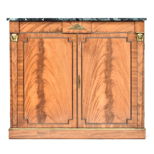 548 - A satinwood side cabinet, the marble top over two doors, having applied brass mouldings with invert ... 