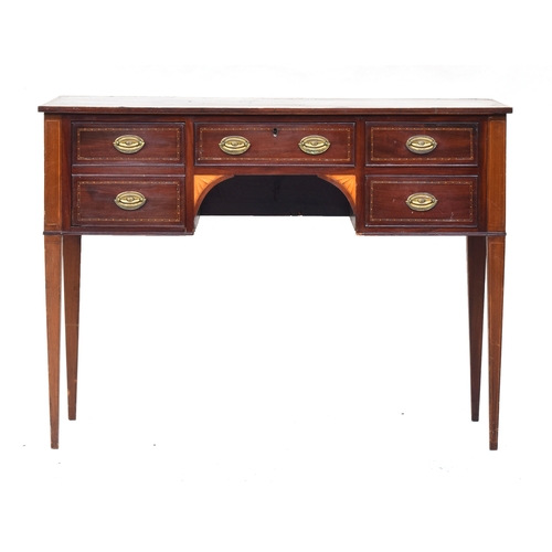 581 - A Regency mahogany and marquetry dressing table, the top with central marquetry urn motif and spandr... 