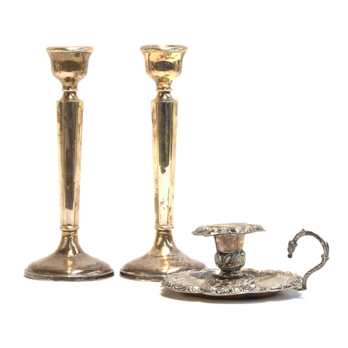 148 - A pair of George V loaded silver candlesticks, by Kemp Brothers, London 1927, each 20cm high; togeth... 