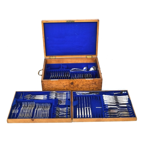 57 - An oak cased canteen of plated kings pattern flatware, with brass loop handles, by Goldsmiths & Silv... 