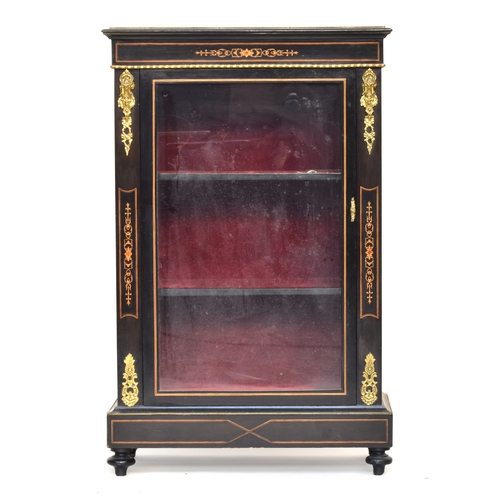 574 - An ebonised and ormolu mounted glazed cabinet bookcase of three velvet lined shelves, 89cm wide, 35c... 