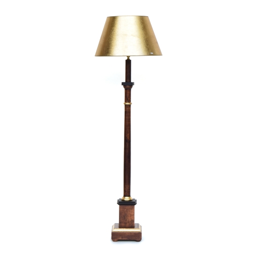 572 - A turned wood and parcel gilt standard lamp, on square base, approximately 120cm high