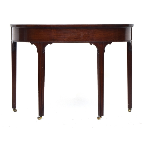 585 - A 19th century mahogany D-end dining table, central drop leaf section, on moulded square section leg... 