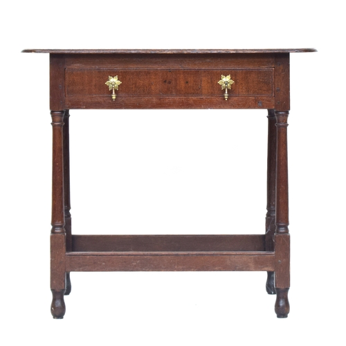 579 - An 18th century oak side table, single frieze drawer, on turned legs and peripheral stretchers, 74cm... 