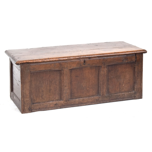 515 - A 17th century three panel oak coffer, two plank top, 120cm wide, 45cm deep, 47cm high