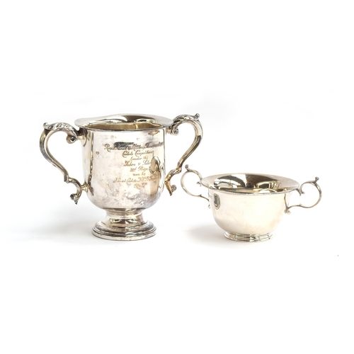 108 - A twin handled silver trophy cup by Horace Woodward & Co Ltd, London 1912, with acanthus capped hand... 